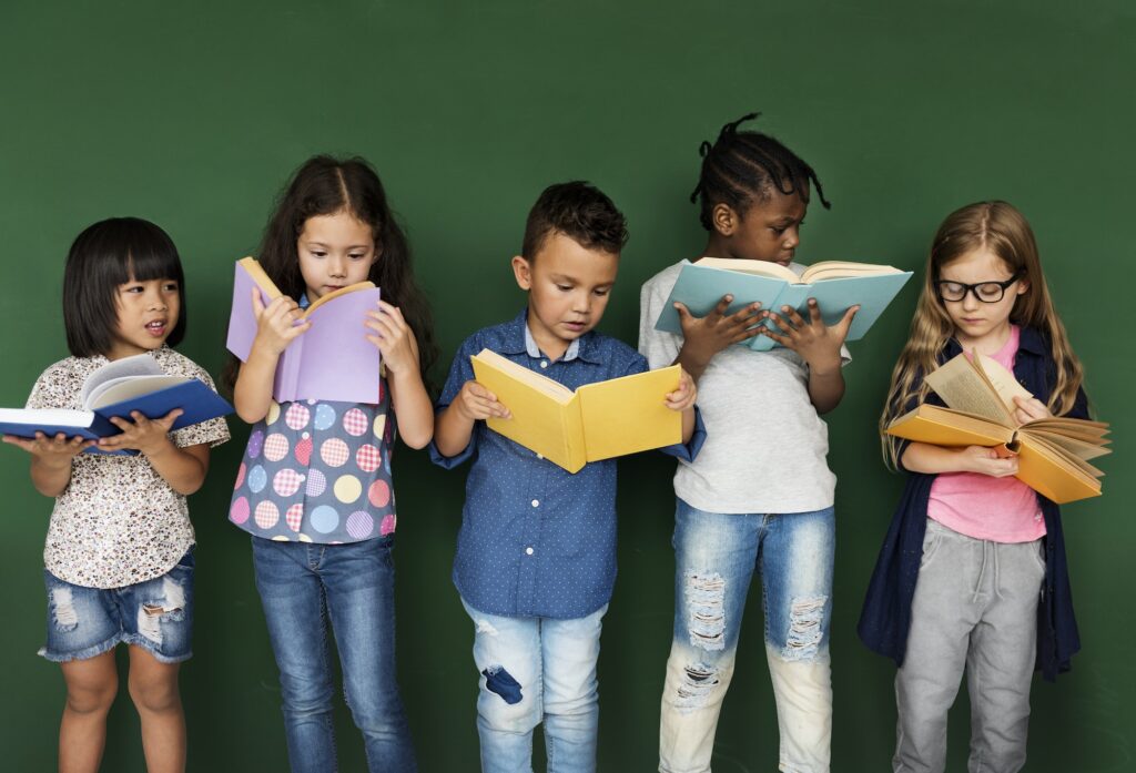 Diverse kids reading books